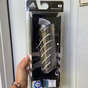 Adidas Shin guards size S . New in package